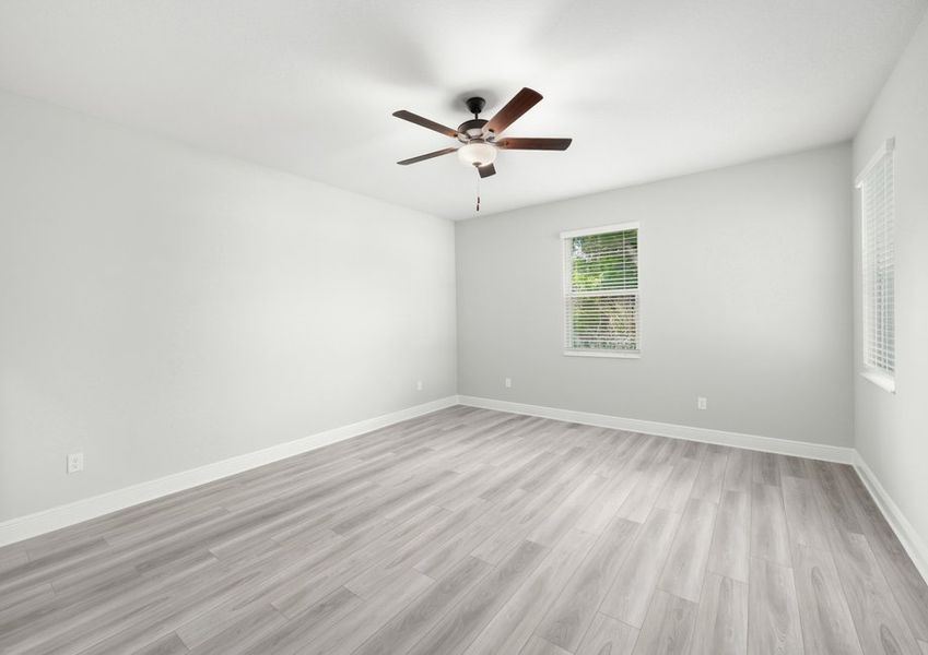The master bedroom has plenty of space for your king-sized furniture