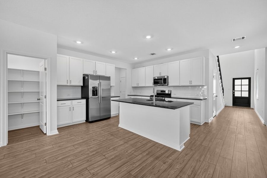 Furnished interior view inside a new home in Sunfield, Buda (Image 17).