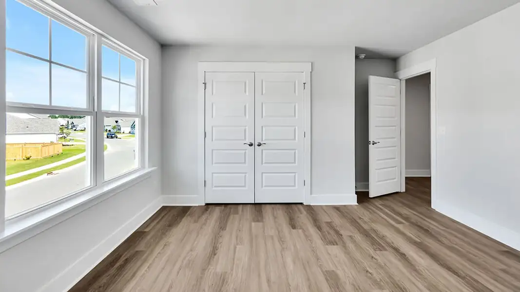 Spacious, unfurnished interior of a new home in Magnolia Ridge at Blake Farm, Wilmington (Image 32). Spacious, unfurnished interior of a new home in Magnolia Ridge at Blake Farm, Wilmington (Image 32).