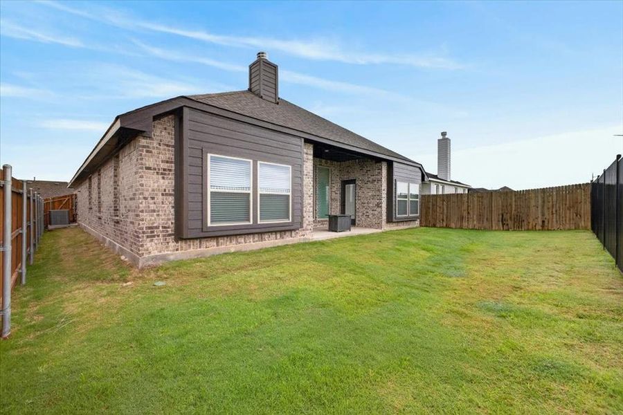 Exterior details and patio area of a home in , Godley (Image 23).