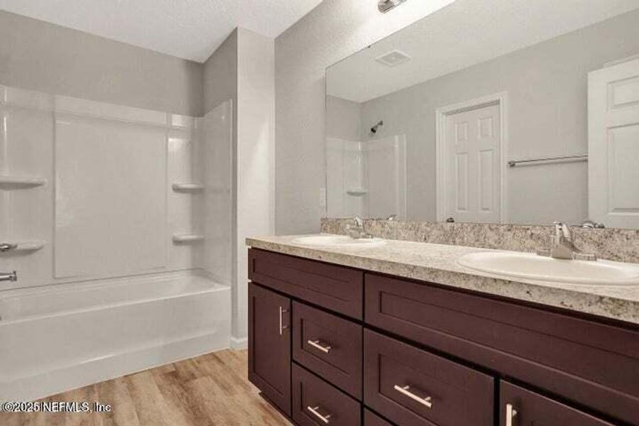 Furnished interior view inside a new home in , Jacksonville (Image 11). Furnished interior view inside a new home in , Jacksonville (Image 11).