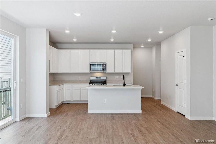 Furnished interior view inside a new home in Paired Homes at Alder Creek, Parker (Image 7).
