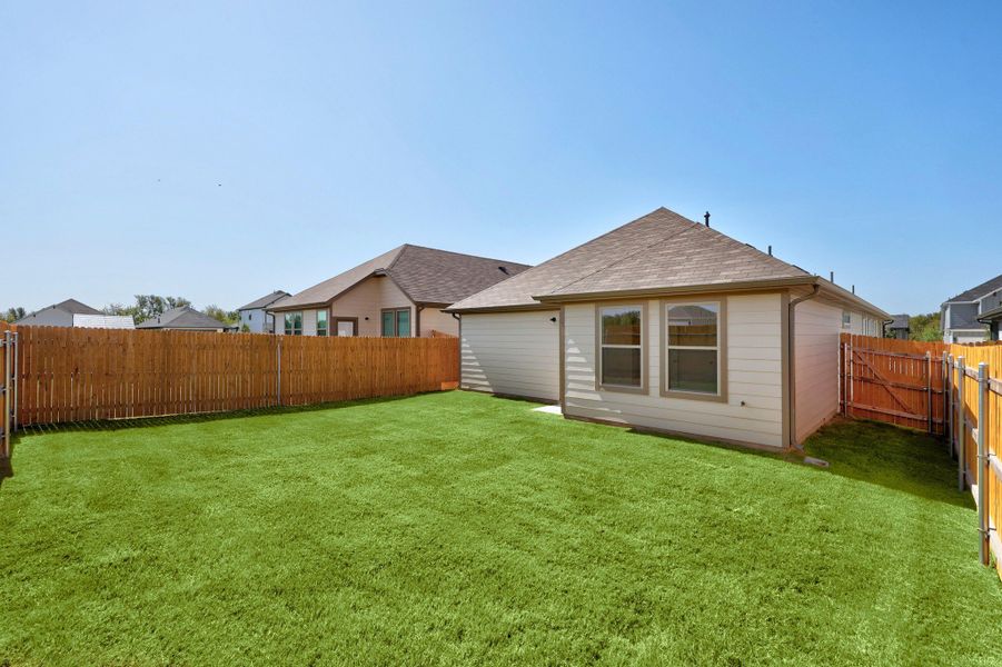 Exterior details and patio area of a home in Trinity Ranch, Elgin (Image 21).