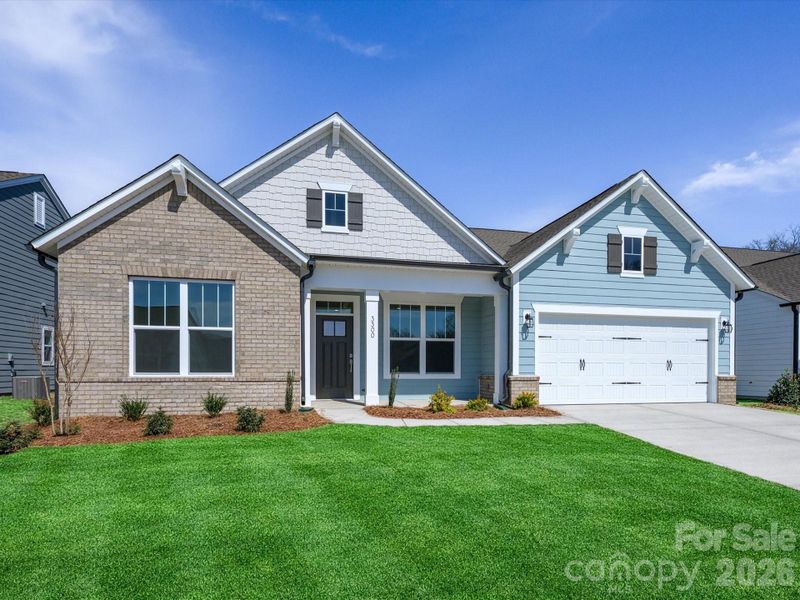 Front exterior of a new home in Encore at Harmony, Harrisburg, NC, highlighting curb appeal (Image 20).