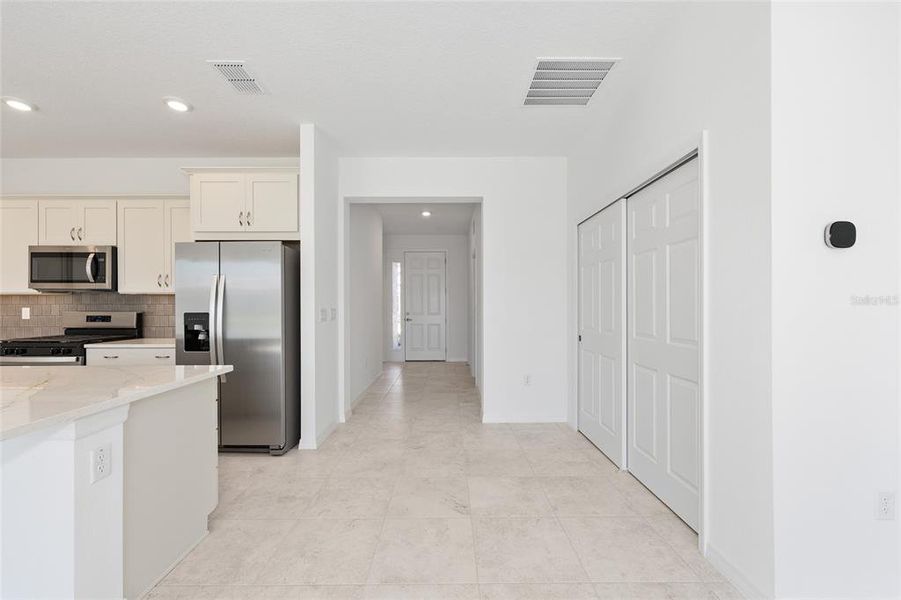 Furnished interior view inside a new home in Calesa Township, Ocala (Image 5).