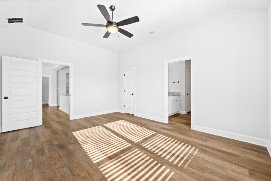 Spacious, unfurnished interior of a new home in Whisper Valley, Manor (Image 7).