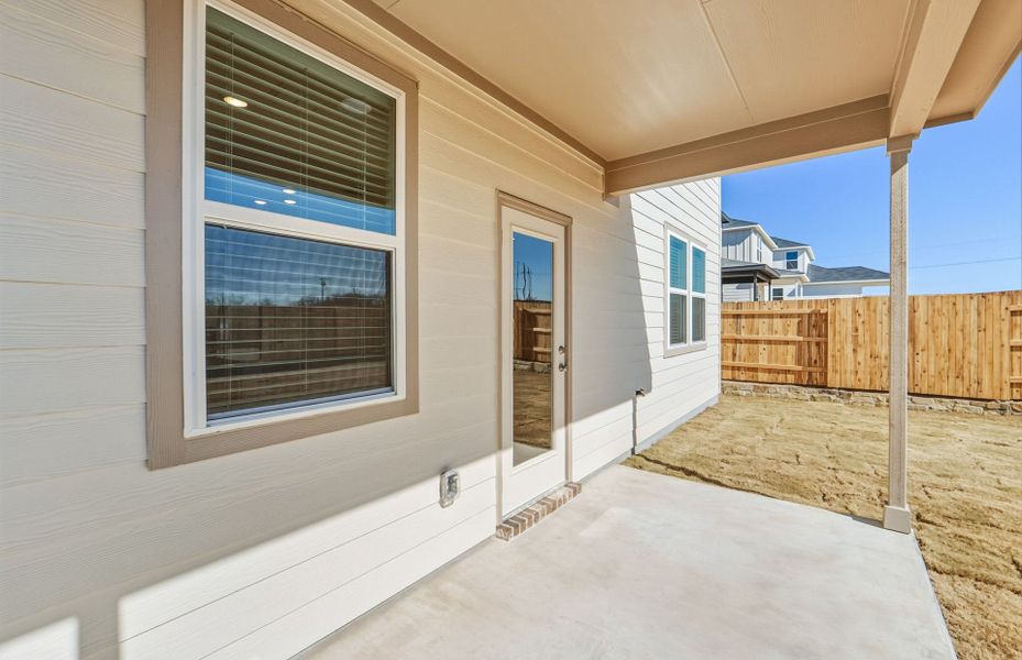 Exterior details and patio area of a home in Sunfield, Buda (Image 25).