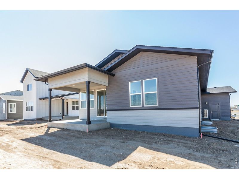 Exterior details and patio area of a home in Prairie Song Story Collection - Single Family Homes, Windsor (Image 4).