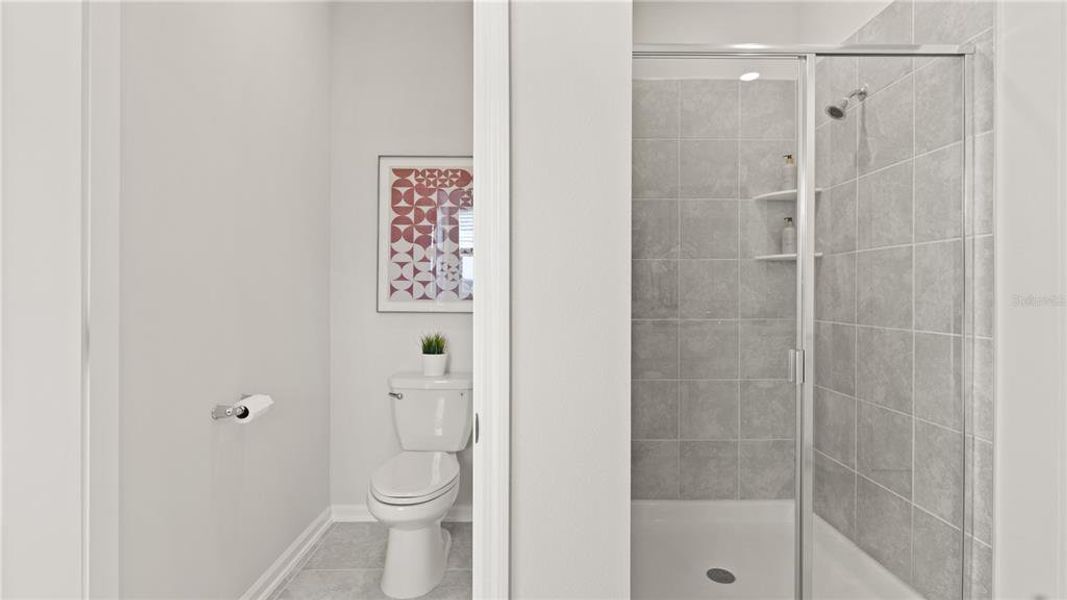 Furnished interior view inside a new home in Wellness Ridge, Clermont (Image 15).