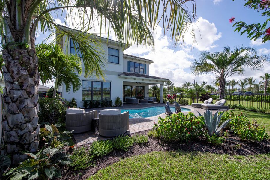 Exterior details and patio area of a home in Apex at Avenir, Palm Beach Gardens (Image 4).
