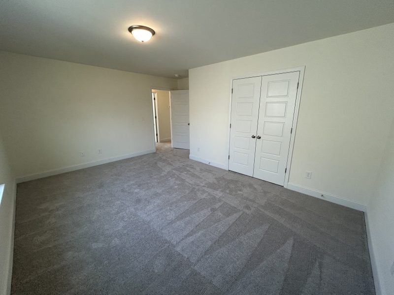 Spacious, unfurnished interior of a new home in Miller's Reserve, Winston-Salem (Image 47).