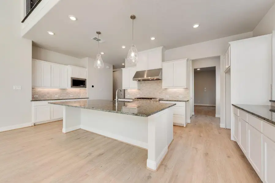 Furnished interior view inside a new home in South Pointe, Mansfield (Image 6).
