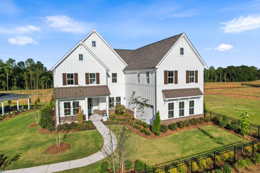 Representative exterior photo of a completed home built from the Stonegate by Pulte Homes in The Retreat at Carolina Ridge, Harrisburg, NC (Image 39). Representative exterior photo of a completed home built from the Stonegate by Pulte Homes in The Retreat at Carolina Ridge, Harrisburg, NC (Image 39).