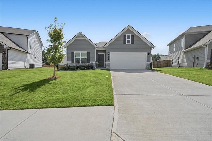 Front exterior of a new home in , Cartersville, GA, highlighting curb appeal (Image 23).