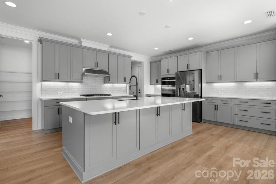 Furnished interior view inside a new home in Amara Chase, Huntersville (Image 4).