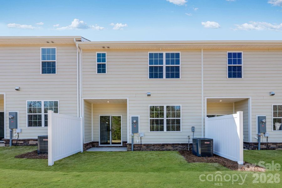 Exterior details and patio area of a home in Cannon Village, York (Image 3).