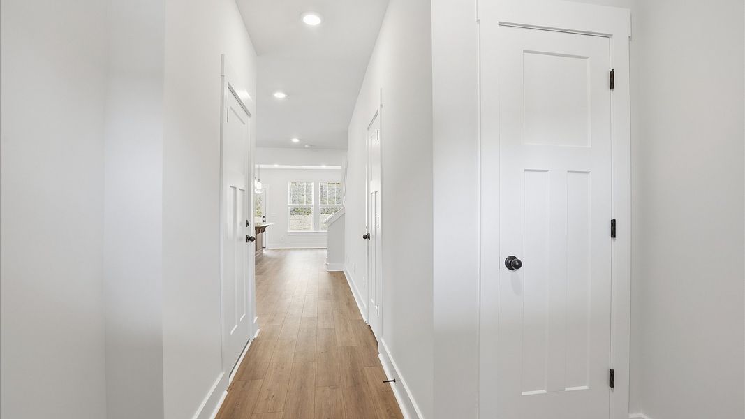 Superior design begins at the front door with a hardwood floor foyer and elegant sightlines near Downtown Greenville Superior design begins at the front door with a hardwood floor foyer and elegant sightlines near Downtown Greenville