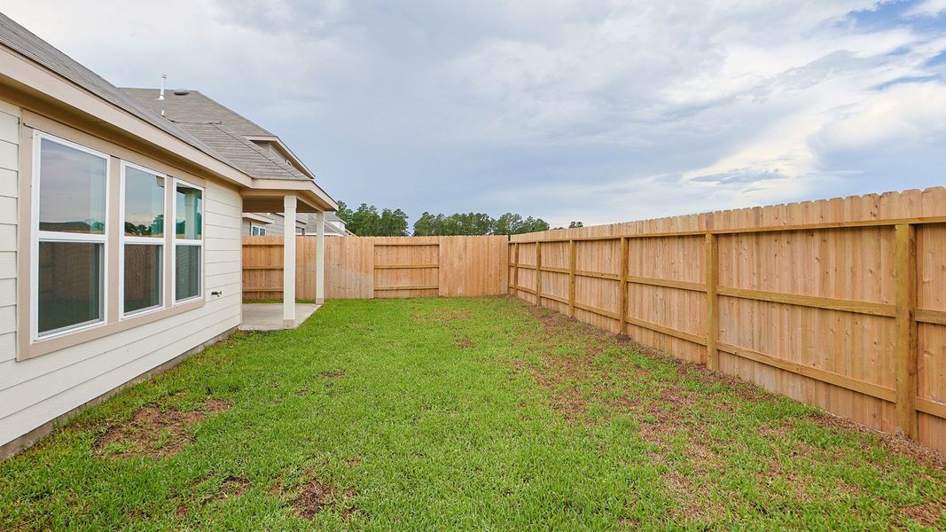 Exterior details and patio area of a home in Mostyn Springs, Magnolia (Image 3).