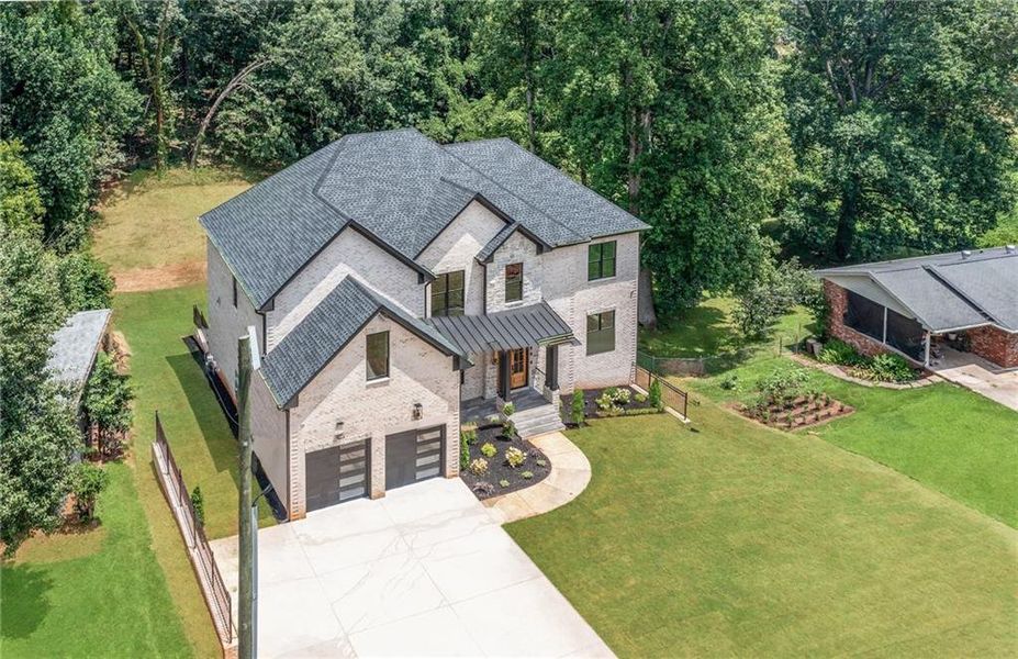Front exterior of a new home in , Buford, GA, highlighting curb appeal (Image 2). Front exterior of a new home in , Buford, GA, highlighting curb appeal (Image 2).