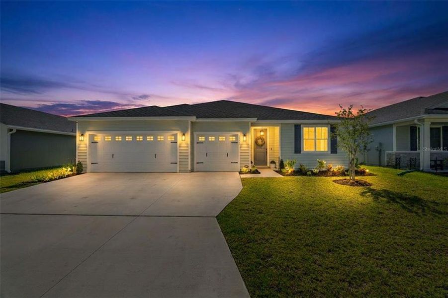 Front exterior of a new home in Azalea Creek, Jacksonville, FL, highlighting curb appeal (Image 21). Front exterior of a new home in Azalea Creek, Jacksonville, FL, highlighting curb appeal (Image 21).