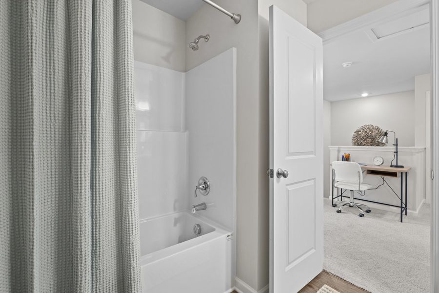 Representative furnished interior of a home built from the Myrtle L by McGuinn Homes in Canary Woods, Hopkins (Image 28). Representative furnished interior of a home built from the Myrtle L by McGuinn Homes in Canary Woods, Hopkins (Image 28).