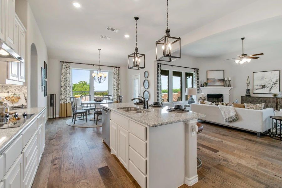 Kitchen to Nook | Concept 2434 at Coyote Crossing in Godley, TX by Landsea Homes