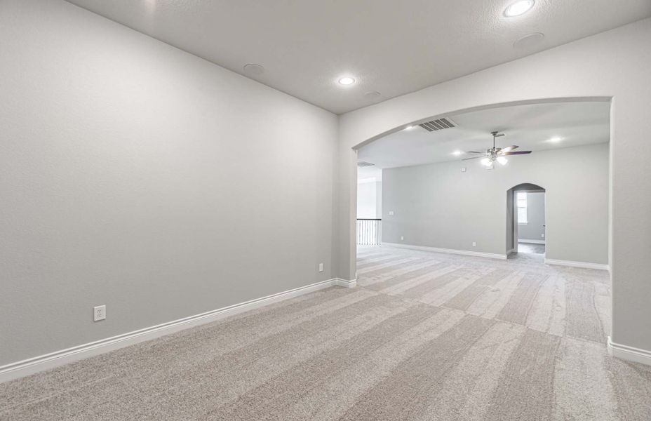 Representative unfurnished interior of a home built from the 4195 by Ravenna Homes in Artavia 70′, Conroe (Image 62). Representative unfurnished interior of a home built from the 4195 by Ravenna Homes in Artavia 70′, Conroe (Image 62).