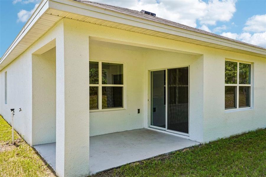 Exterior details and patio area of a home in Lake Diamond, Ocala (Image 25).