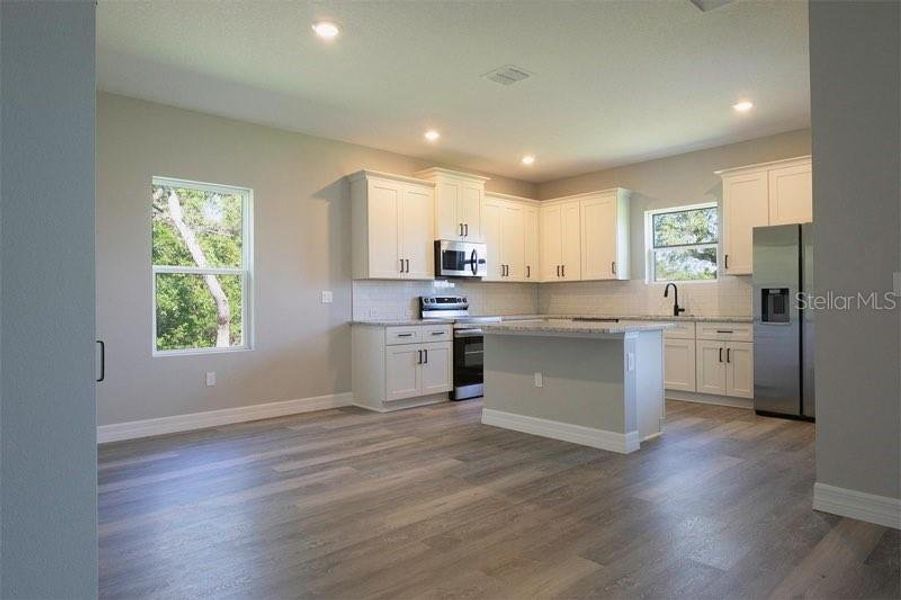 Furnished interior view inside a new home in , Ocala (Image 8).
