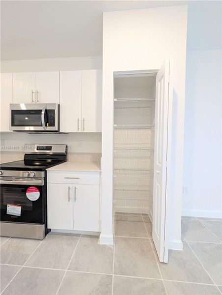 Furnished interior view inside a new home in , Florida City (Image 8).
