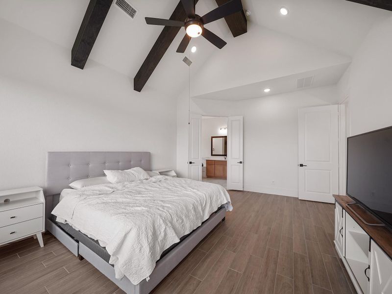 Another perspective shows off the room’s generous proportions, creating a sanctuary that feels both impressive and intimate.