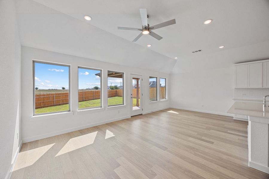 Open Living Space in the Colorado home plan by Trophy Signature Homes – REPRESENTATIVE PHOTO Open Living Space in the Colorado home plan by Trophy Signature Homes – REPRESENTATIVE PHOTO