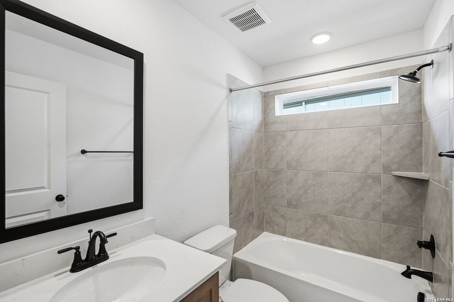 Furnished interior view inside a new home in Prominence, San Antonio (Image 13).