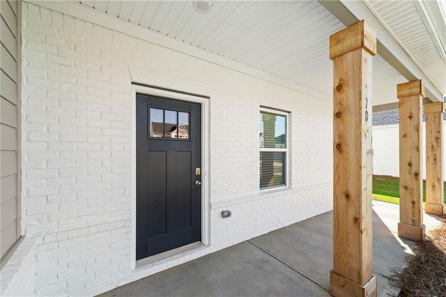 Exterior details and patio area of a home in Conner Springs, Social Circle (Image 3).