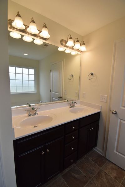 Furnished interior in a model home at The Wilcox in Greensboro (Image 17).