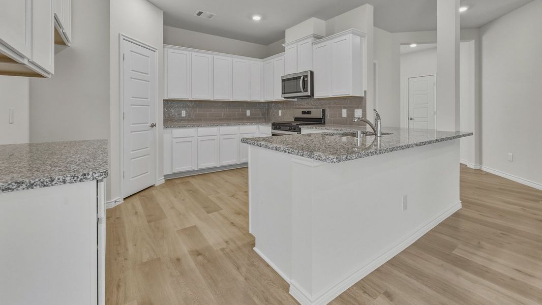 Furnished interior view inside a new home in Bel Air Village, Sherman (Image 6). Furnished interior view inside a new home in Bel Air Village, Sherman (Image 6).