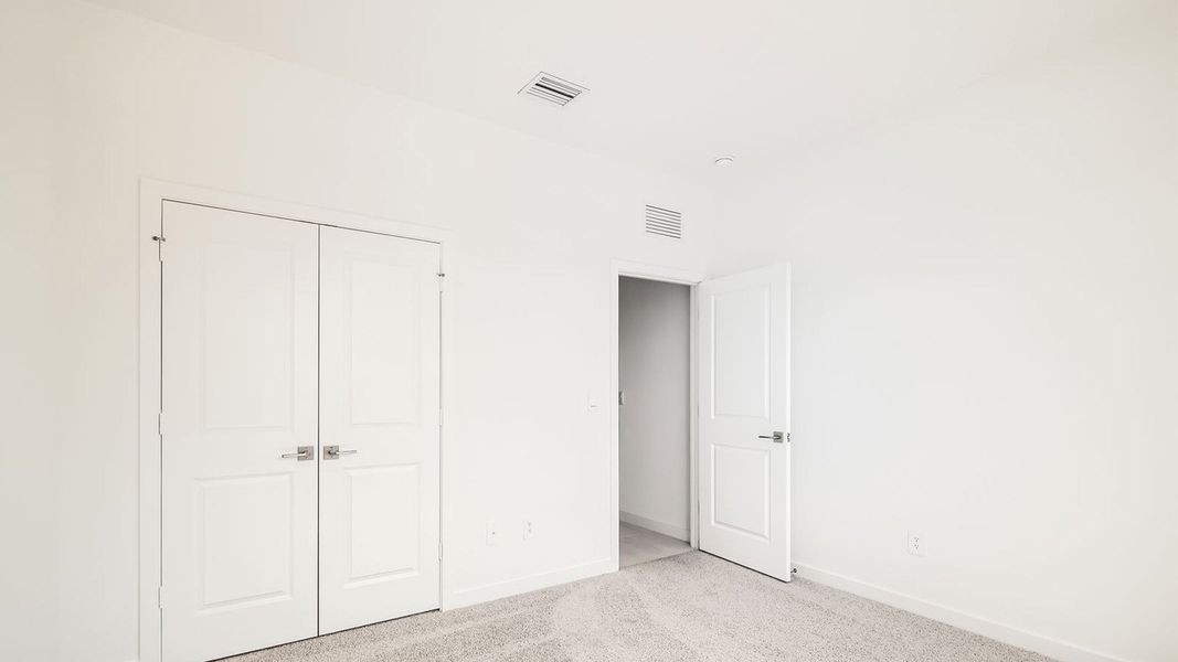 Representative unfurnished interior of a home built from the Delray by D.R. Horton in Twin Oaks, Stuart (Image 18).