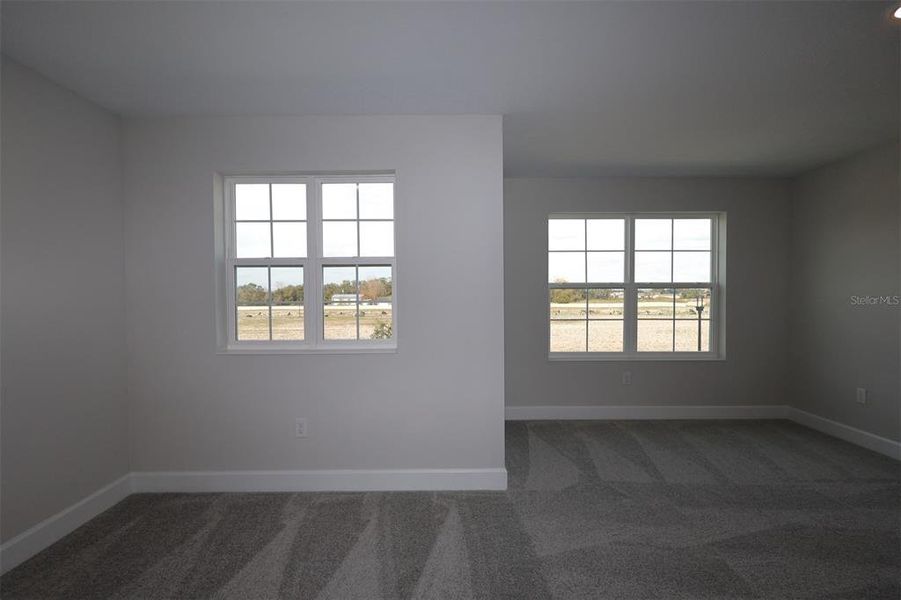 Spacious, unfurnished interior of a new home in Center Lake on the Park, St. Cloud (Image 11).