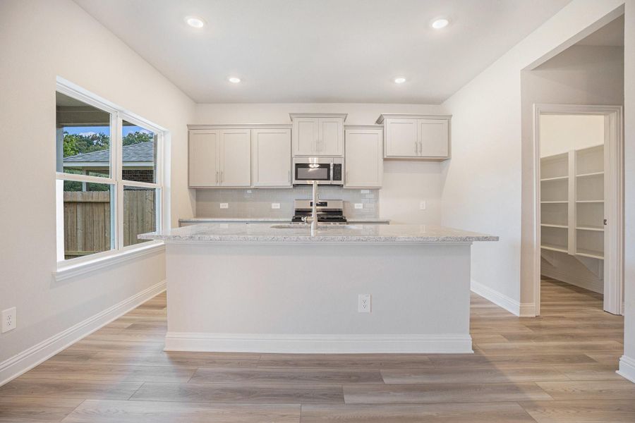Furnished interior view inside a new home in Bayou Maison, Dickinson (Image 7).