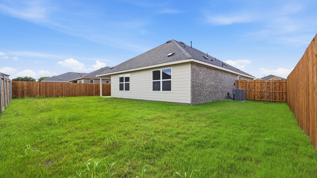 Exterior details and patio area of a home in Patriot Estates, Venus (Image 25).