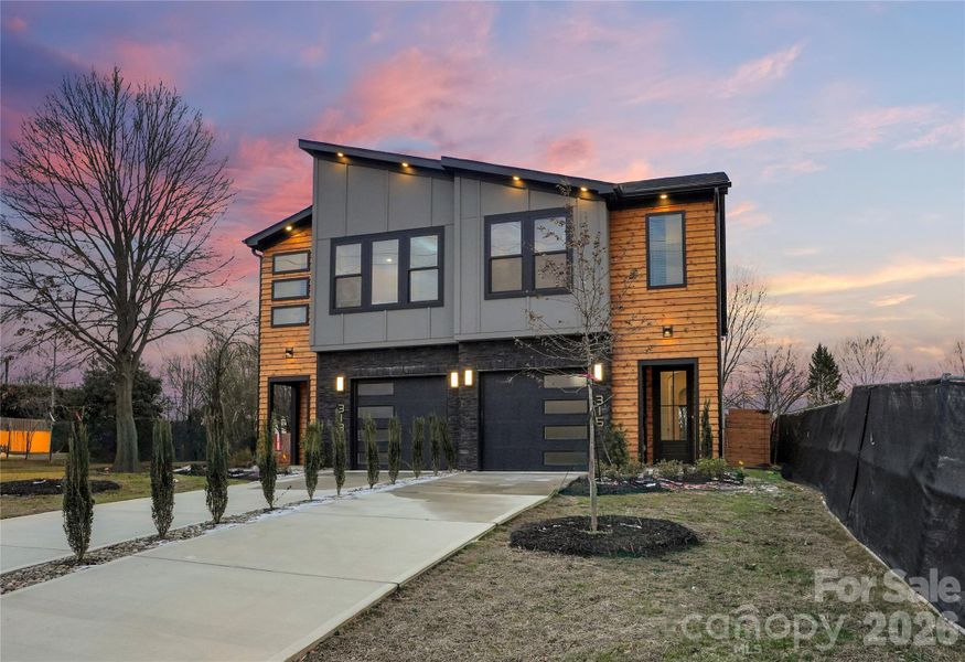 Front exterior of a new home in , Charlotte, NC, highlighting curb appeal (Image 2). Front exterior of a new home in , Charlotte, NC, highlighting curb appeal (Image 2).