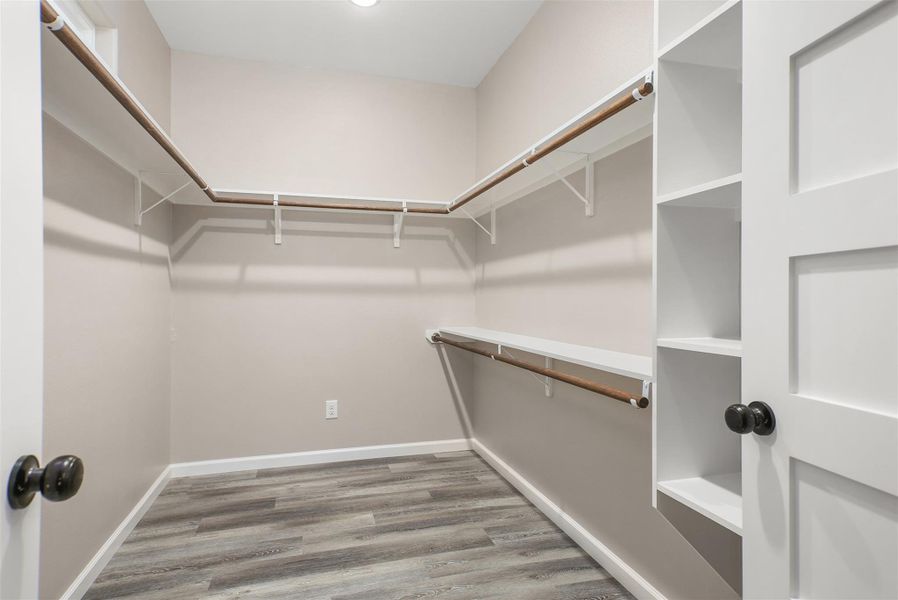 Large walk-in closet in the primary bedroom
