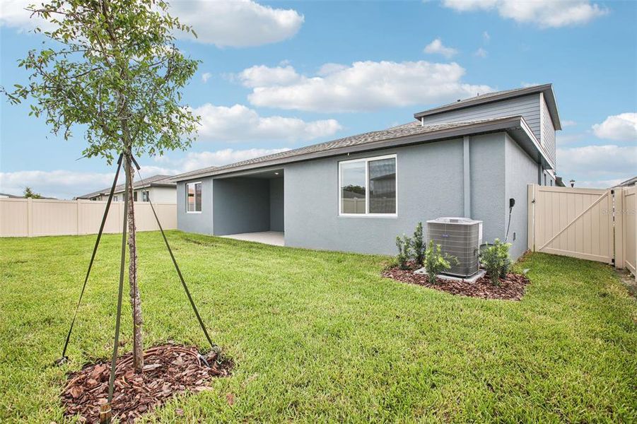 Exterior details and patio area of a home in Two Rivers - Signature Series, Zephyrhills (Image 17).