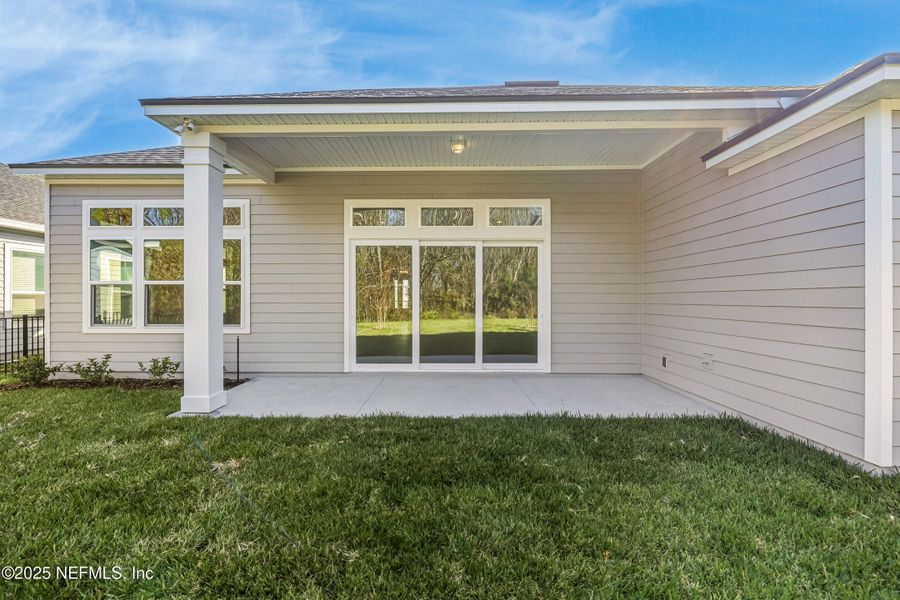 Exterior details and patio area of a home in Silver Landing at SilverLeaf, St. Augustine (Image 36).