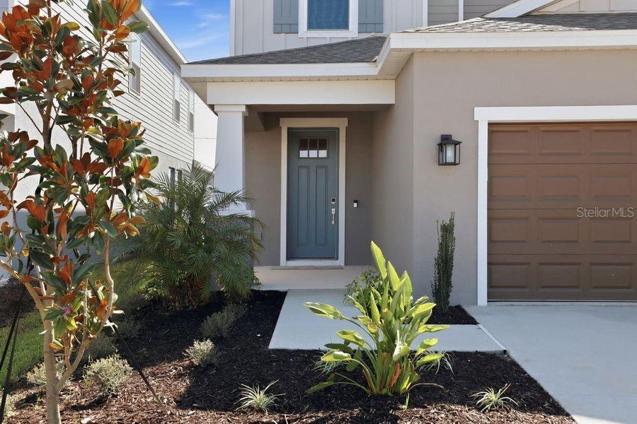 Exterior details and patio area of a home in Indigo Creek, Apollo Beach (Image 29).