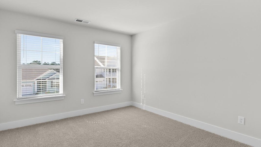 Spacious, unfurnished interior of a new home in Indigo Preserve, Leland (Image 34).