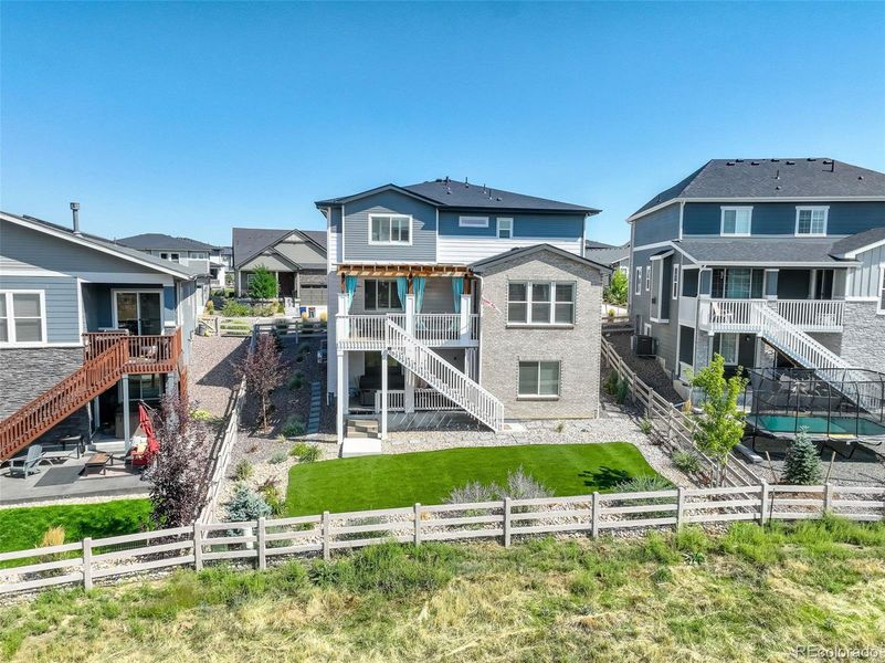 Front exterior of a new home in , Littleton, CO, highlighting curb appeal (Image 22).