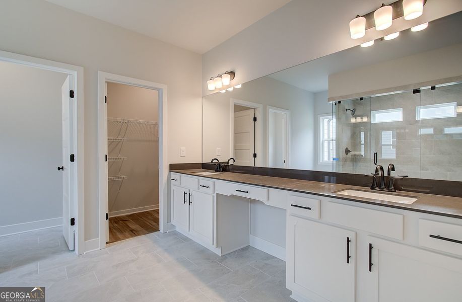 Furnished interior view inside a new home in Ponderosa Farms Reserve, Gainesville (Image 13).