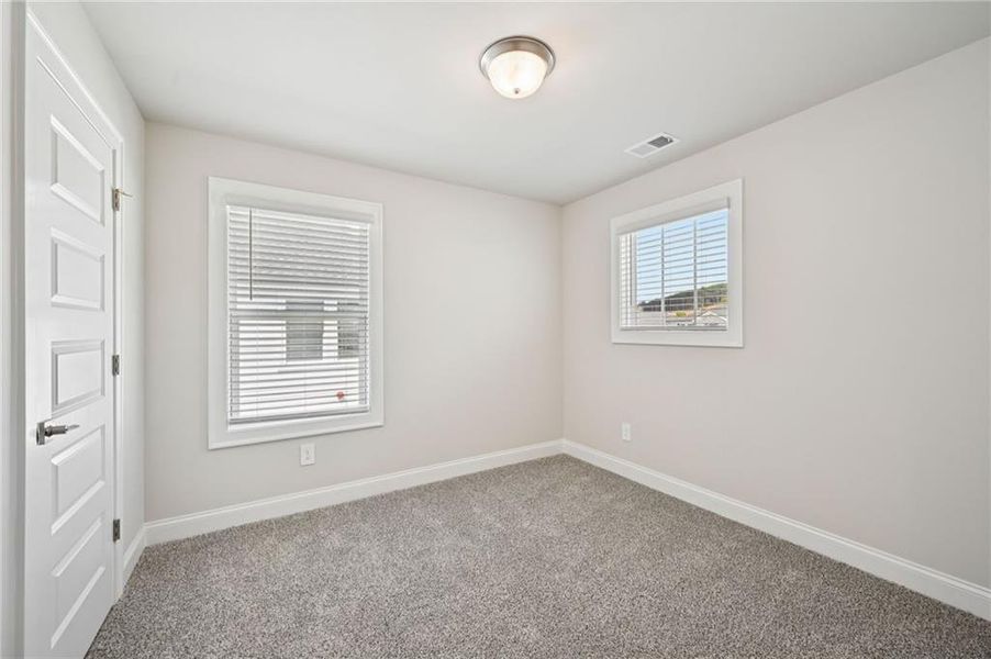 Spacious, unfurnished interior of a new home in Hemingway - Reserve Series, Cumming (Image 32).