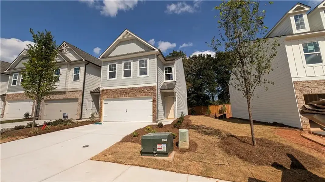 Front exterior of a new home in Owen Preserve, Canton, GA, highlighting curb appeal (Image 17). Front exterior of a new home in Owen Preserve, Canton, GA, highlighting curb appeal (Image 17).